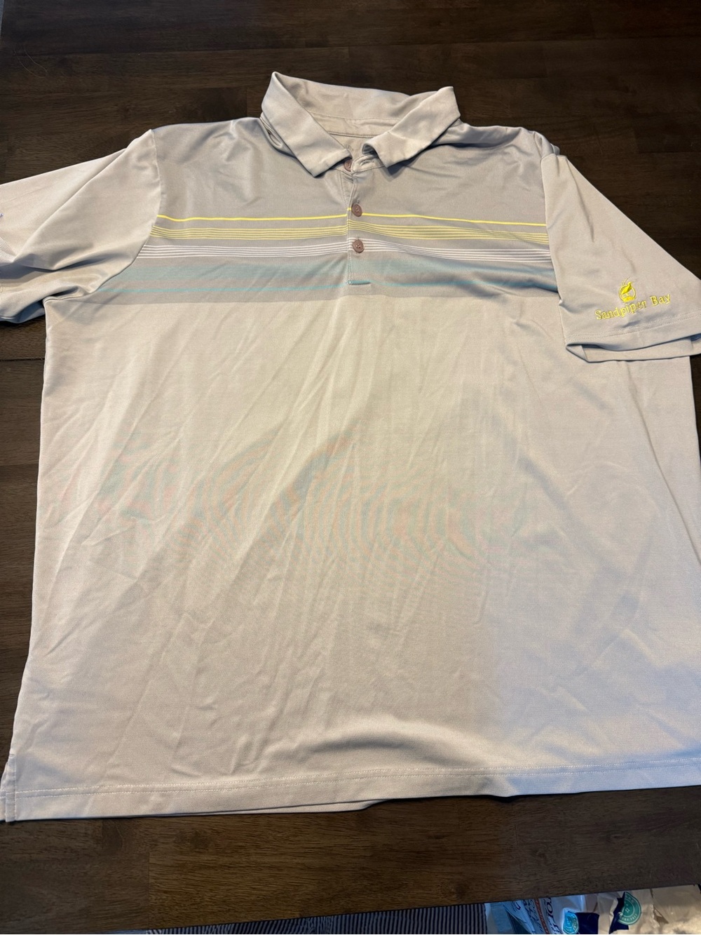 Sandpiper Bay golf course  Men's Light Blue Striped Polo Shirt